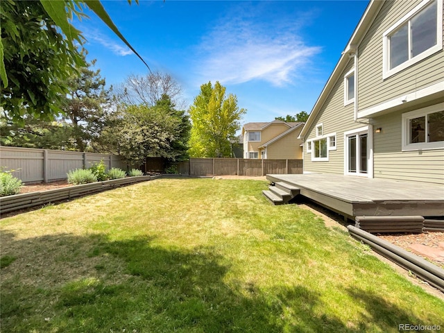 view of yard featuring a deck