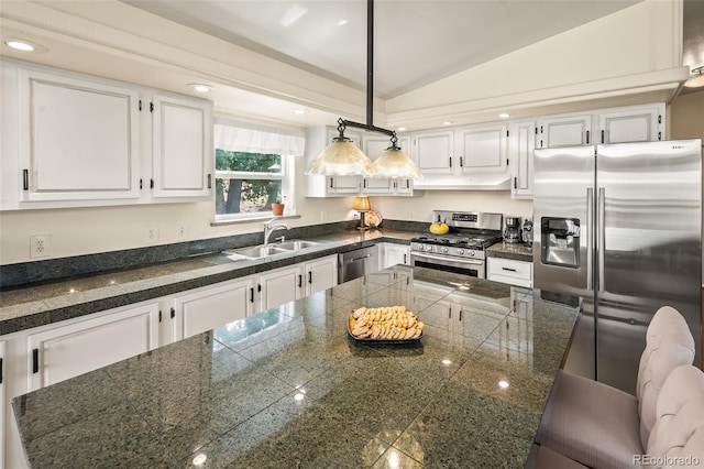 7260 Remington Rd, Como, CO 80432 - kitchen featuring tile counters, stainless steel appliances, a sink, under cabinet range hood, and white cabinetry