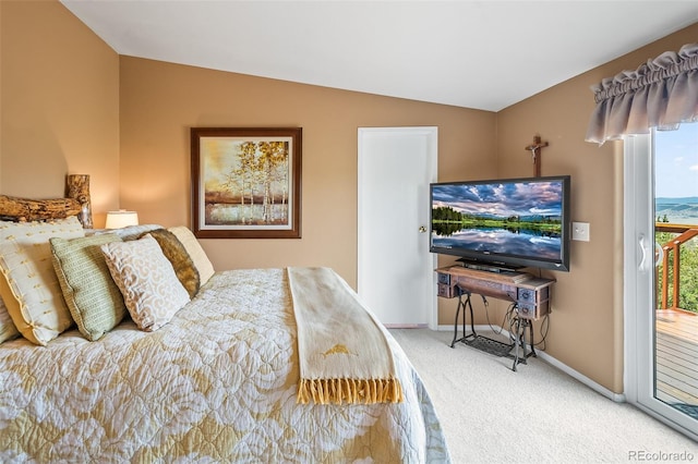 7260 Remington Rd, Como, CO 80432 - carpeted bedroom with access to exterior, vaulted ceiling, and baseboards