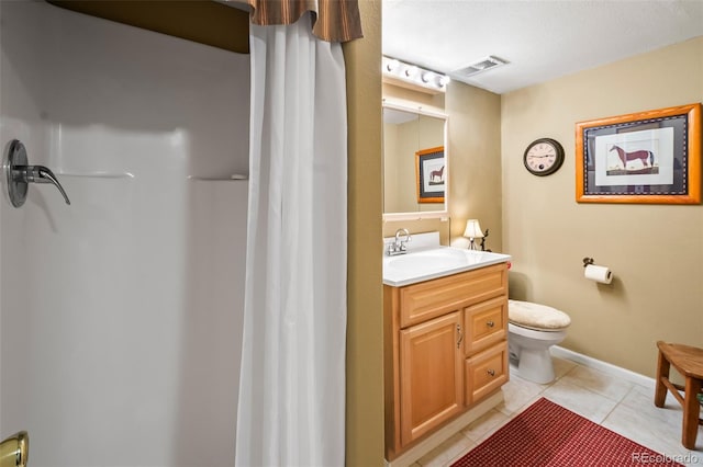 7260 Remington Rd, Como, CO 80432 - bathroom featuring toilet, vanity, tile patterned floors, baseboards, and curtained shower
