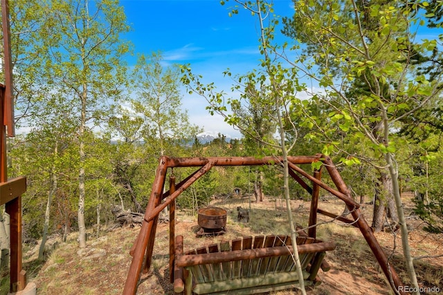 7260 Remington Rd, Como, CO 80432 - wooden terrace with a fire pit