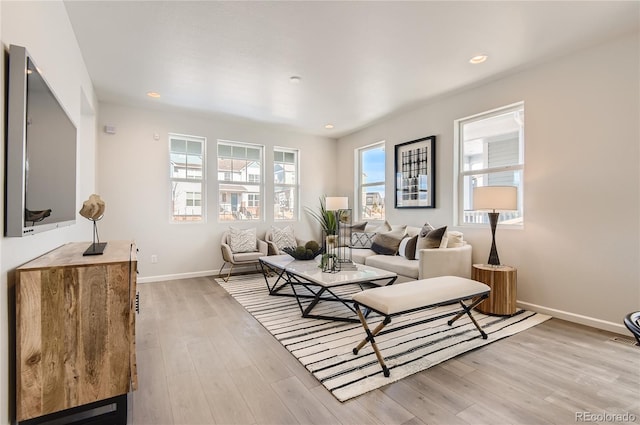 6581 E 148th Dr, Thornton, CO 80602 - living room with light wood finished floors and recessed lighting