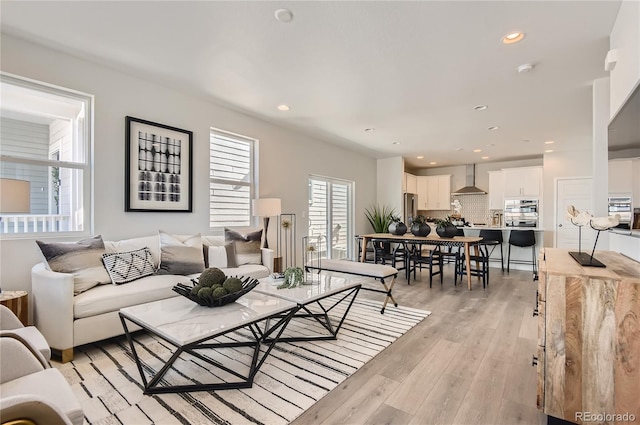 6581 E 148th Dr, Thornton, CO 80602 - living room with light wood-style flooring and recessed lighting