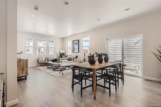 6581 E 148th Dr, Thornton, CO 80602 - dining room with plenty of natural light, light wood-style flooring, and recessed lighting