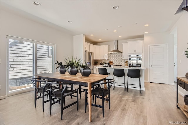 6581 E 148th Dr, Thornton, CO 80602 - dining room featuring light wood finished floors and recessed lighting