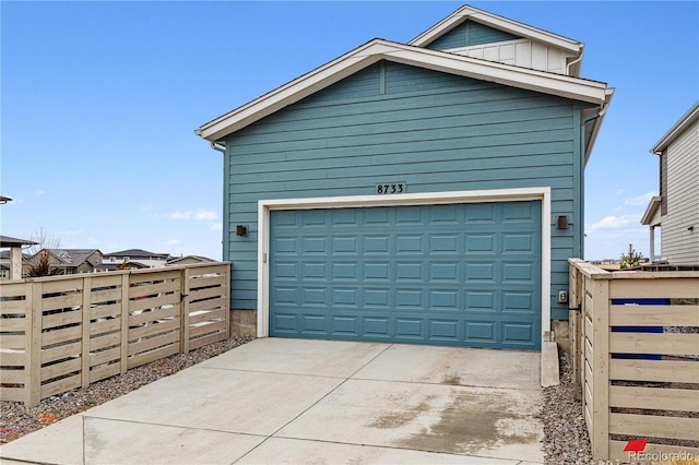 garage featuring fence