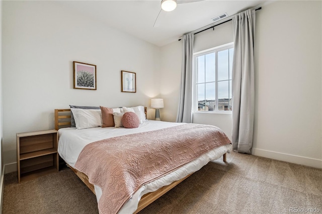 bedroom with baseboards, visible vents, and carpet floors