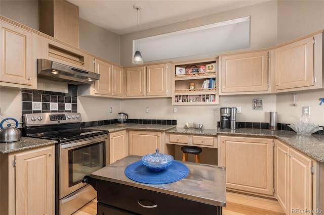 kitchen featuring stainless steel electric stove and light brown cabinets