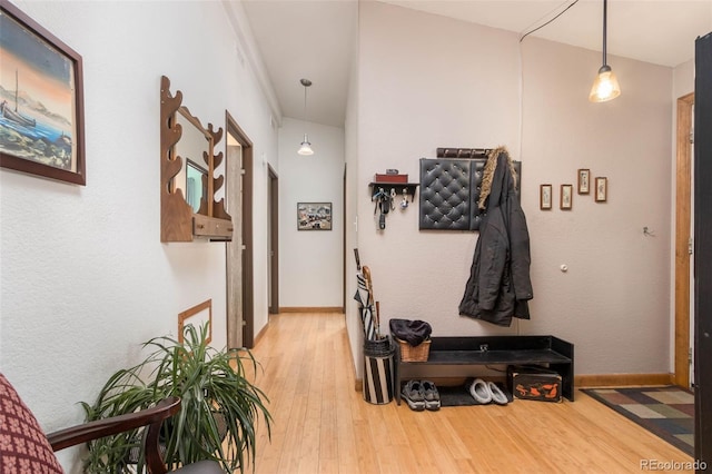 corridor featuring hardwood / wood-style floors