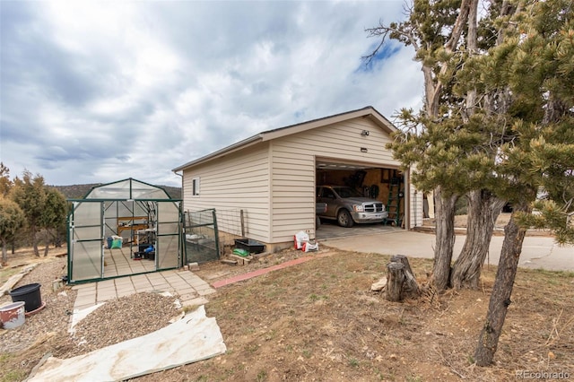 view of outbuilding with a garage