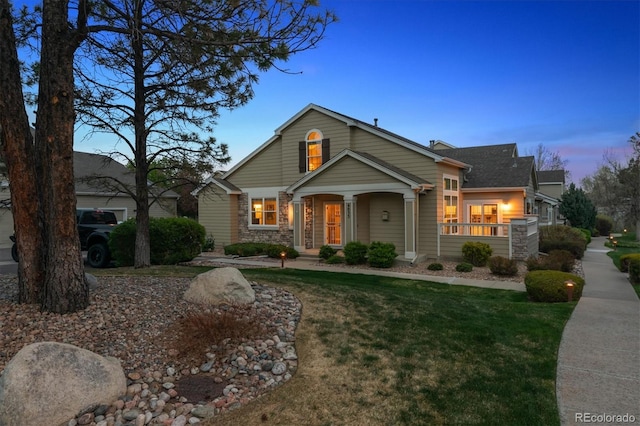 6033 Trailhead Rd, Highlands Ranch, CO 80130 - view of front of house featuring a yard
