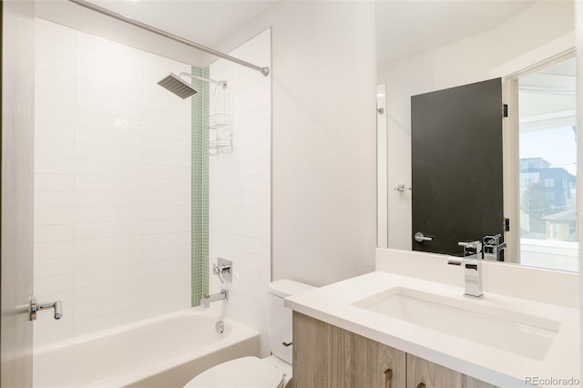 full bath featuring toilet, vanity, and bathtub / shower combination