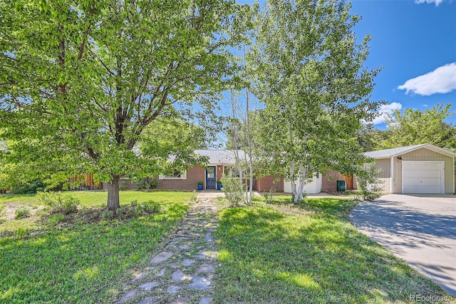 305 Cottonwood Ct, Longmont, CO 80501 - obstructed view of property with concrete driveway and a front lawn