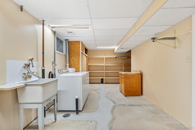2698 S Niagara St, Denver, CO 80224 - below grade area featuring separate washer and dryer and a drop ceiling