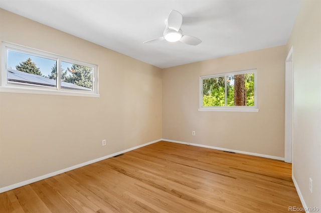 2698 S Niagara St, Denver, CO 80224 - unfurnished room with light wood-style floors and ceiling fan