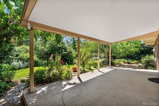 2698 S Niagara St, Denver, CO 80224 - view of patio with view of wooded area