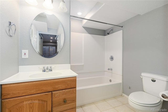 full bathroom featuring tile patterned floors, vanity, toilet, and shower / washtub combination