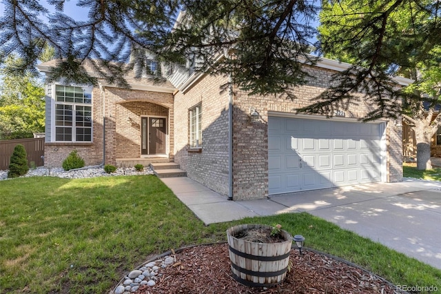 view of front facade featuring a garage and a front lawn