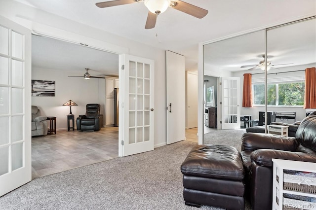 795 S Alton Way Unit 4C, Denver, CO 80247 - carpeted living room with french doors and a ceiling fan