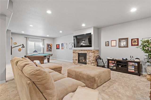 carpeted living room featuring a stone fireplace and billiards