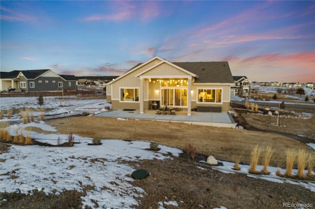 view of snow covered property