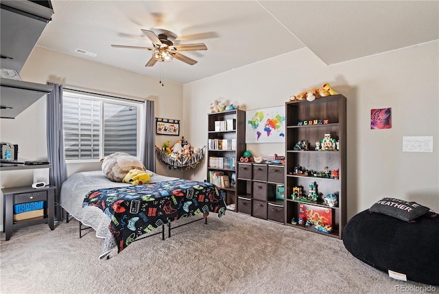 carpeted bedroom featuring ceiling fan