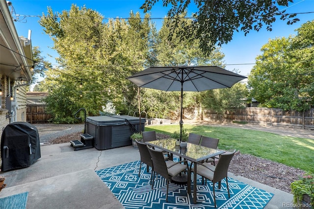 view of patio with outdoor dining space, a fenced backyard, a grill, and a hot tub