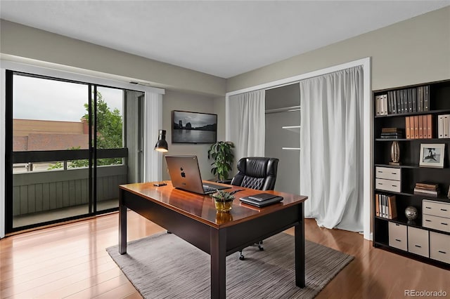 14214 E 1st Dr Unit B08, Aurora, CO 80011 - home office featuring wood finished floors