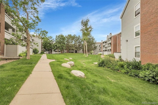 14214 E 1st Dr Unit B08, Aurora, CO 80011 - view of grassy yard featuring a residential view