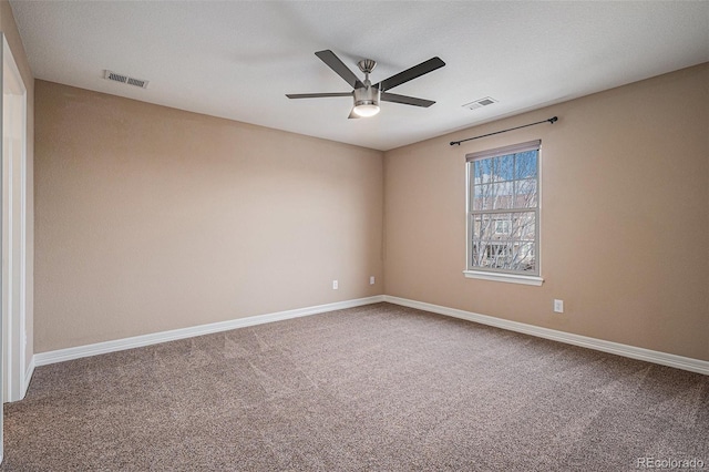 unfurnished room with carpet floors and ceiling fan