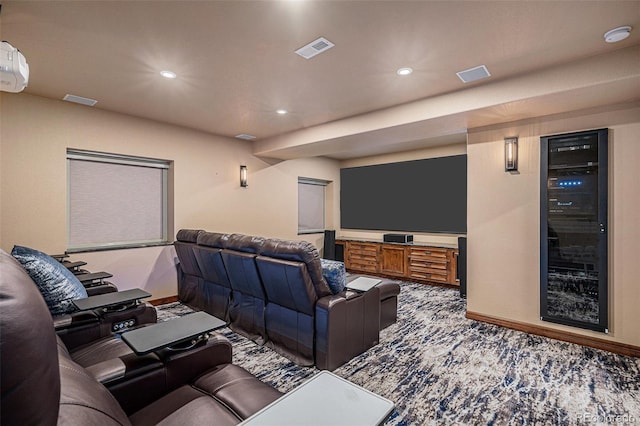 cinema room featuring carpet flooring