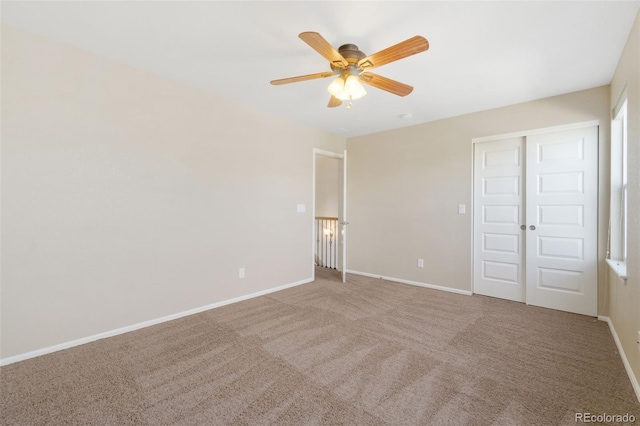 5894 Graphite St, Timnath, CO 80547 - unfurnished bedroom with a closet, carpet floors, and ceiling fan