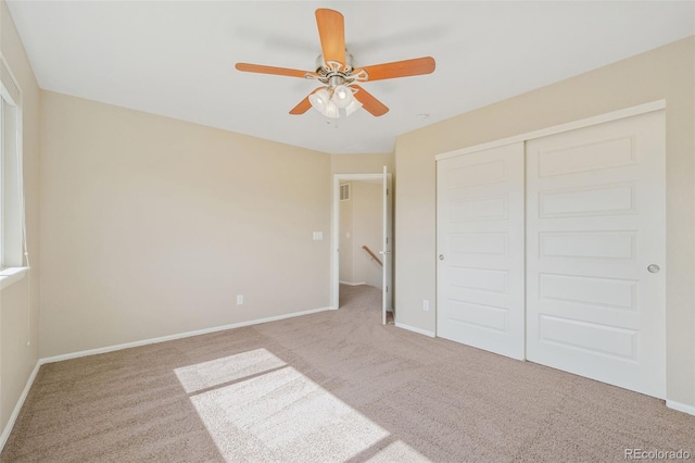5894 Graphite St, Timnath, CO 80547 - unfurnished bedroom featuring carpet floors, a closet, and ceiling fan