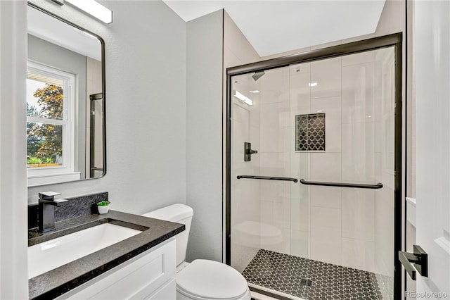 6842 Garland St, Arvada, CO 80004 - bathroom with vanity and a stall shower