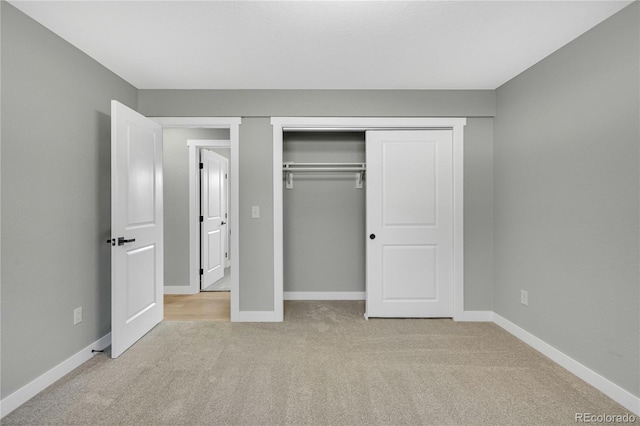 6842 Garland St, Arvada, CO 80004 - unfurnished bedroom with light carpet and a closet