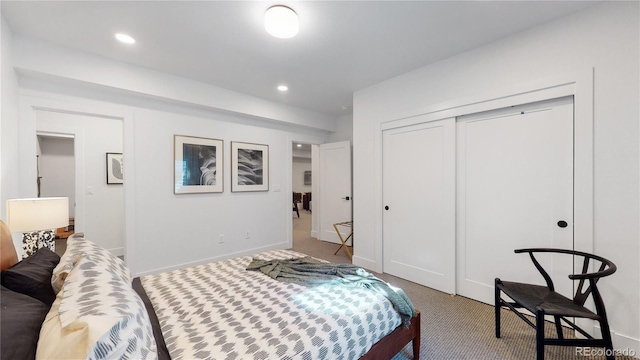 carpeted bedroom with a closet