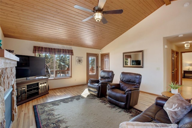 living room with high vaulted ceiling, a fireplace, ceiling fan, wooden ceiling, and light wood-type flooring