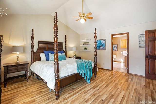 bedroom with ceiling fan, connected bathroom, vaulted ceiling, and light wood-type flooring