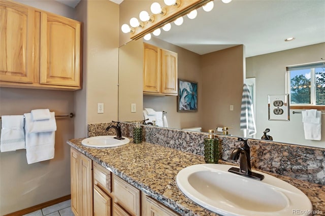 350 Panther Ct, Woodland Park, CO 80863 - bathroom featuring a sink, tile patterned flooring, and double vanity