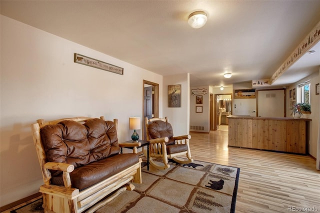 350 Panther Ct, Woodland Park, CO 80863 - living room featuring light wood-style flooring, baseboards, and visible vents