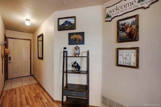 350 Panther Ct, Woodland Park, CO 80863 - hall with baseboards and light wood-style floors
