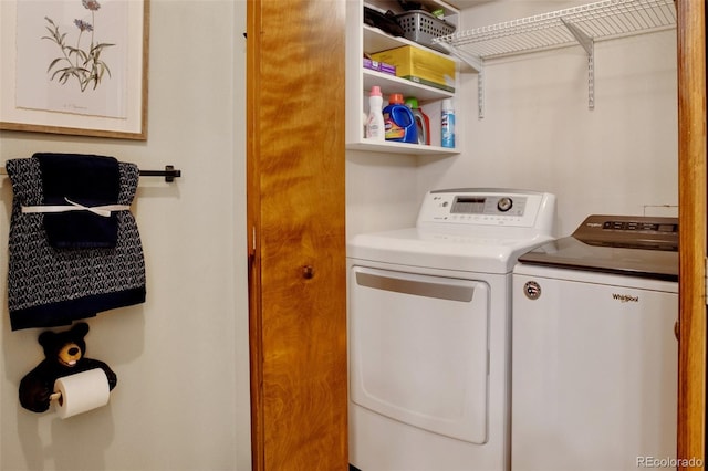 350 Panther Ct, Woodland Park, CO 80863 - clothes washing area featuring washer and clothes dryer and laundry area