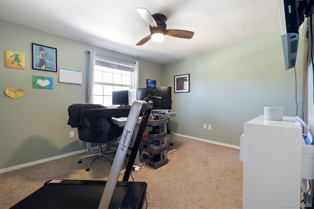 home office with carpet, baseboards, and ceiling fan