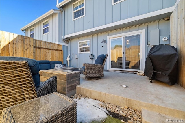 2540 E Geddes Pl, Centennial, CO 80122 - back of house featuring a patio area, board and batten siding, and fence