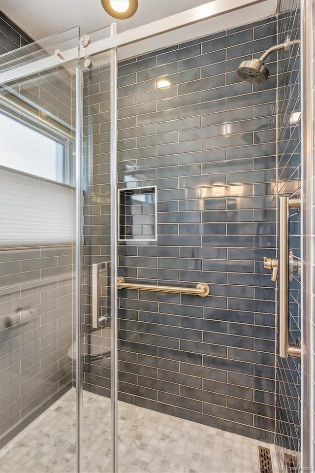 full bathroom with a shower stall