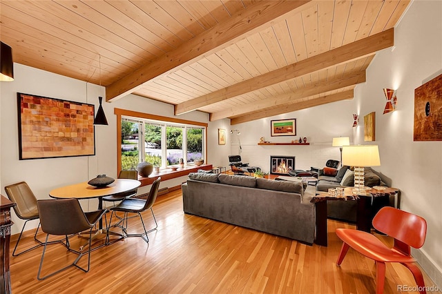 4701 Homestead St, Bow Mar, CO 80123 - living area featuring wooden ceiling, light wood-style floors, and baseboards