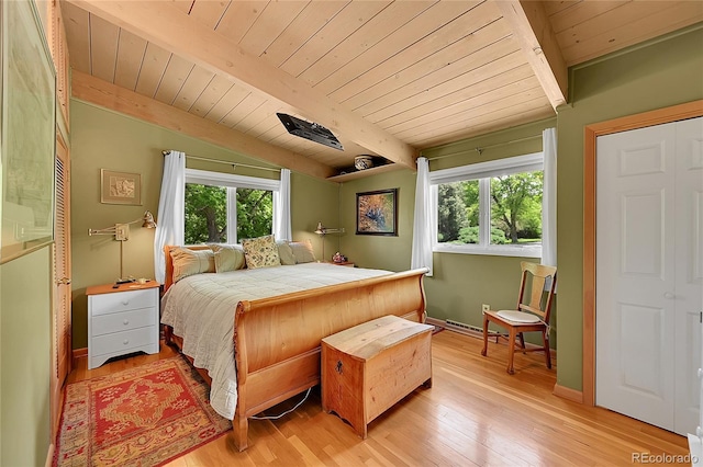 4701 Homestead St, Bow Mar, CO 80123 - bedroom featuring wooden ceiling, multiple windows, light wood-type flooring, and baseboards