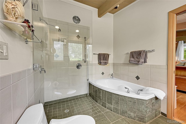 4701 Homestead St, Bow Mar, CO 80123 - full bathroom featuring toilet, a stall shower, a bath, beam ceiling, and tile walls