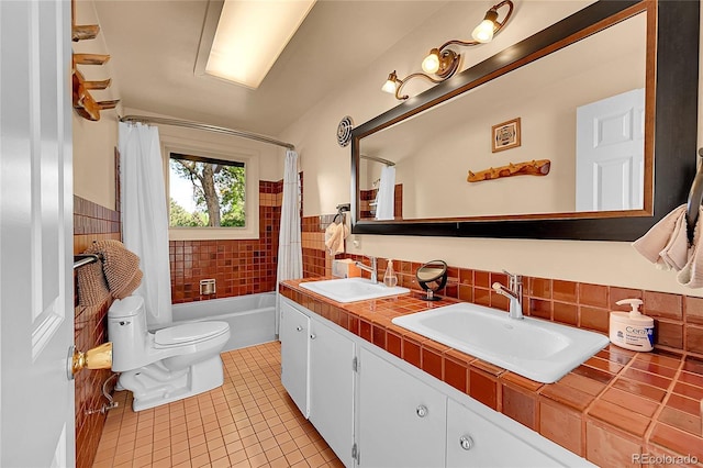 4701 Homestead St, Bow Mar, CO 80123 - bathroom featuring tile patterned flooring, toilet, shower / tub combo, double vanity, and tasteful backsplash