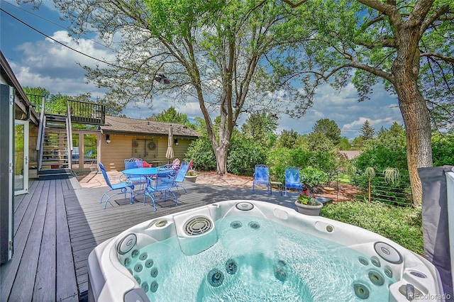 4701 Homestead St, Bow Mar, CO 80123 - wooden deck featuring stairway and outdoor dining space